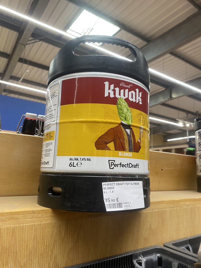 PerfectDraft 6-litre Kwak beer keg displayed inside Calais Vins wine shop in Calais.